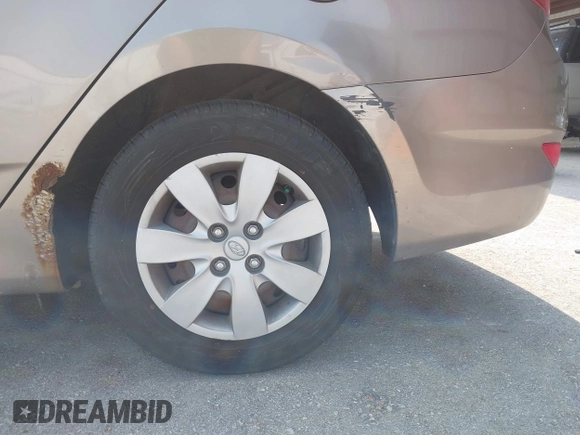 2013 Hyundai Accent GLS with VIN KMHCT4AE1DU358871, listed as a IAAI auction lot 42373080 with 150,443 mi miles and . Bid and sale history available at DreamBid. Image 6.