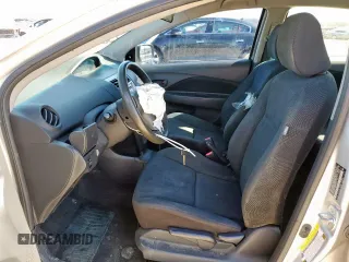 2012 Toyota Yaris with VIN JTDBT4K33C1416217, listed as a Copart auction lot 46714115 with 212,894 mi miles and Salvage Title. Bid and sale history available at DreamBid. Image 7.