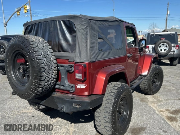 2010 Jeep Wrangler Sahara z VIN 1J4AA5D15AL154750, wystawiony jako Copart lot #55258735 z przebiegiem 157 811 mil mil oraz Czysty tytuł • Clean title. Historia ofert i sprzedaży dostępna na DreamBid. Obrazek 4.