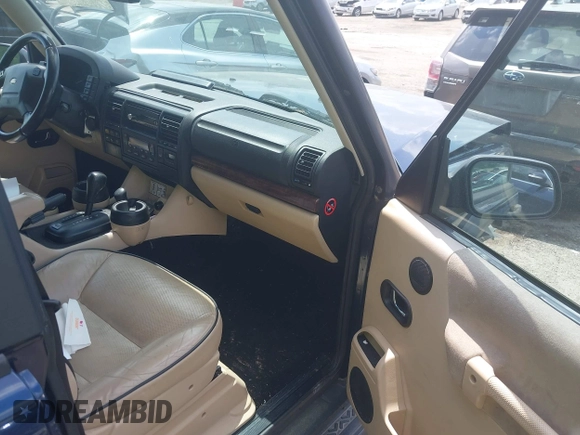 2003 Land Rover Discovery with VIN SALTR16483A787662, listed as a IAAI auction lot 42140472 with 122,446 mi miles and . Bid and sale history available at DreamBid. Image 5.