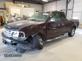 2000 Ford F-150 XL with VIN 1FTZX1726YKB41994, listed as a Copart auction lot 69300034 with 0 mi miles and Salvage Title. Bid and sale history available at carsss.com. Image 1.