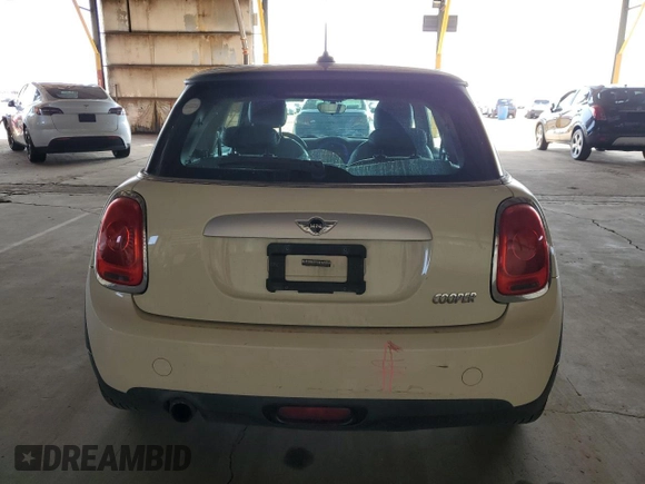 2014 MINI Hardtop with VIN WMWXM5C50ET933486, listed as a Copart auction lot 50823865 with 98,296 mi miles and Salvage Title. Bid and sale history available at DreamBid. Image 6.