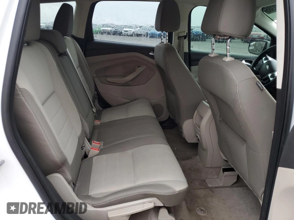2013 Ford Escape SE with VIN 1FMCU9GX7DUA24721, listed as a Copart auction lot 54543385 with 203,036 mi miles and Salvage title. Bid and sale history available at DreamBid. Image 11.