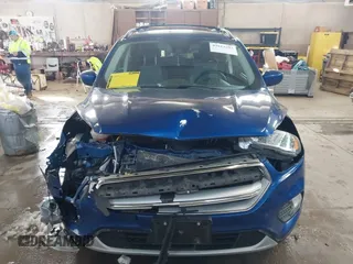 2018 Ford Escape SE z VIN 1FMCU9GD1JUB80500, wystawiony jako IAAI lot #41613294 z przebiegiem 112 187 mil mil oraz . Historia ofert i sprzedaży dostępna na DreamBid. Obrazek 12.