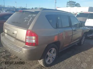 2007 Jeep Compass Sport with VIN 1J8FT47W57D158543, listed as a IAAI auction lot 41817636 with 241,439 mi miles. Bid and sale history available at carsss.com. Image 4.