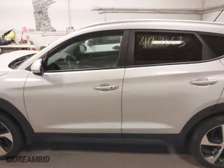 2016 Hyundai Tucson Eco with VIN KM8J3CA25GU138743, listed as a IAAI auction lot 41802063 with 70,989 mi miles. Bid and sale history available at carsss.com. Image 14.