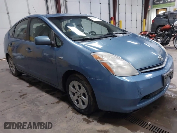 2007 Toyota Prius z VIN JTDKB20U477559103, wystawiony jako IAAI lot #41957891 z przebiegiem 285 452 mil mil oraz . Historia ofert i sprzedaży dostępna na DreamBid. Obrazek 1.