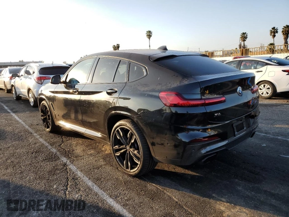 2020 BMW X4 M40i with VIN 5UX2V5C0XL9B53828, listed as a Copart auction lot 43190795 with 55,374 mi miles and Salvage title. Bid and sale history available at DreamBid. Image 2.