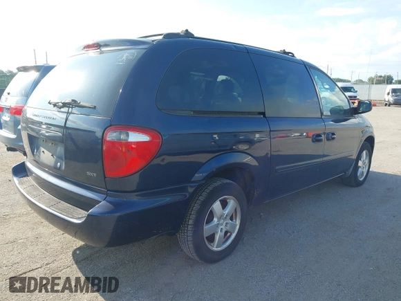 2005 Dodge Caravan SXT with VIN 2D4GP44L65R565519, listed as a IAAI auction lot 42730269 with 124,848 mi miles and . Bid and sale history available at DreamBid. Image 4.