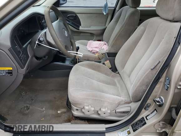 2005 Hyundai Elantra GLS z VIN KMHDN46D05U169323, wystawiony jako Copart lot #55138445 z przebiegiem 142 454 mil mil oraz Czysty tytuł • Clean title. Historia ofert i sprzedaży dostępna na DreamBid. Obrazek 7.