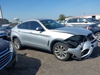 2018 BMW X6 xDrive35i z VIN 5UXKU2C51J0X50507, wystawiony jako IAAI lot #40275236 z przebiegiem 67 523 mil mil oraz . Historia ofert i sprzedaży dostępna na DreamBid. Obrazek 13.