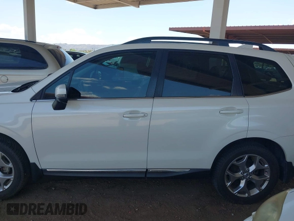 2018 Subaru Forester Touring z VIN JF2SJAWC6JH580632, wystawiony jako IAAI lot #42237986 z przebiegiem 38 446 mil mil oraz . Historia ofert i sprzedaży dostępna na DreamBid. Obrazek 13.
