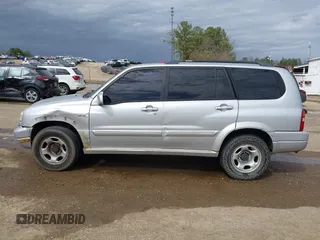 2002 Suzuki XL7 Standard z VIN JS3TY92V824101190, wystawiony jako IAAI lot #41749203 z przebiegiem 239 447 mil mil oraz . Historia ofert i sprzedaży dostępna na DreamBid. Obrazek 14.