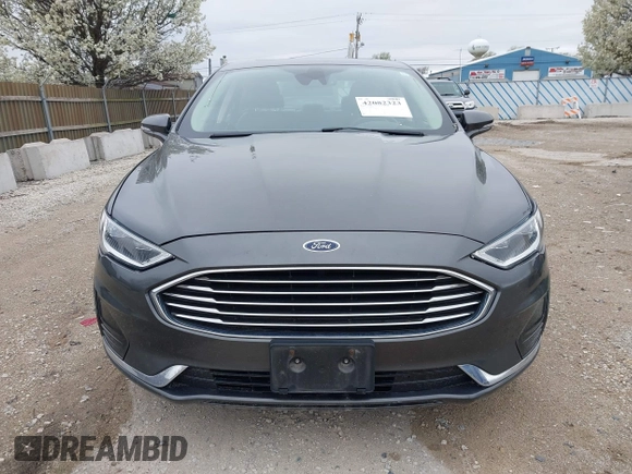2019 Ford Fusion SEL with VIN 3FA6P0CDXKR129411, listed as a IAAI auction lot 42082323 with 126,048 mi miles and . Bid and sale history available at DreamBid. Image 12.