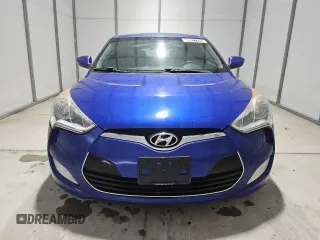 2013 Hyundai Veloster w/Black Int z VIN KMHTC6AD2DU125066, wystawiony jako Copart lot #60921325 z przebiegiem 189 503 mil mil oraz Czysty tytuł • Clean title. Historia ofert i sprzedaży dostępna na DreamBid. Obrazek 5.