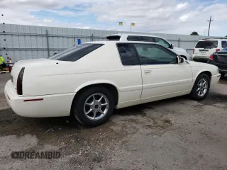 2002 Cadillac Eldorado z VIN 1G6EC12912B106675, wystawiony jako Copart lot #47630055 z przebiegiem 75 354 mil mil oraz Nie do naprawy • Non repairable. Historia ofert i sprzedaży dostępna na DreamBid. Obrazek 3.