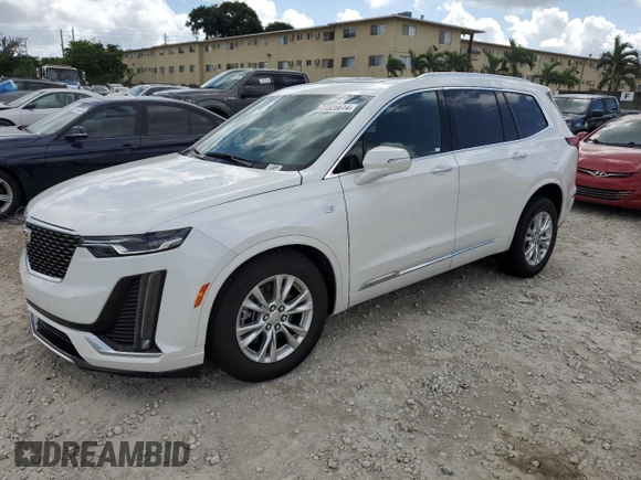 2024 Cadillac XT6 FWD Luxury with VIN 1GYKPAR4XRZ746989, listed as a Copart auction lot 77325614 with 2,234 mi miles and Salvage Title. Bid and sale history available at carsss.com. Image 1.