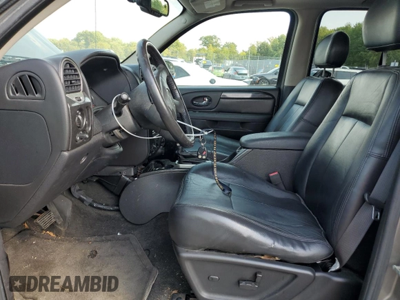 2006 GMC Envoy SLT with VIN 1GKDT13S962305588, listed as a Copart auction lot 69196964 with 118,289 mi miles and Salvage Title. Bid and sale history available at DreamBid. Image 7.