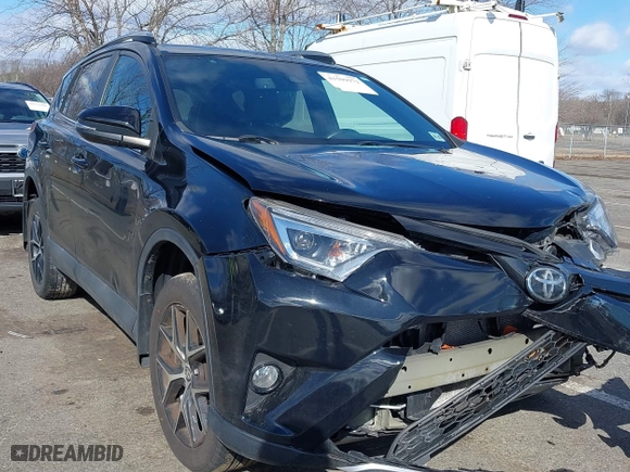 2018 Toyota RAV4 SE with VIN 2T3JFREVXJW817341, listed as a IAAI auction lot 41599972 with 99,739 mi miles. Bid and sale history available at carsss.com. Image 1.