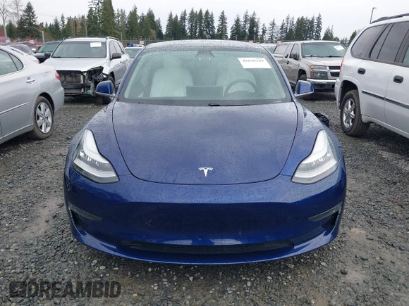 2019 Tesla Model 3 Long Range with VIN 5YJ3E1EB8KF512950, listed as a IAAI auction lot 41836349 with 55,607 mi miles and . Bid and sale history available at DreamBid. Image 12.