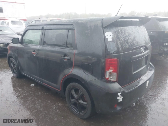2012 Scion xB with VIN JTLZE4FE3CJ008728, listed as a IAAI auction lot 42000043 with 172,199 mi miles. Bid and sale history available at carsss.com. Image 3.