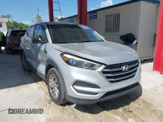 2018 Hyundai Tucson SE with VIN KM8J23A48JU646278, listed as a IAAI auction lot 41941577 with 115,228 mi miles. Bid and sale history available at carsss.com. Image 1.
