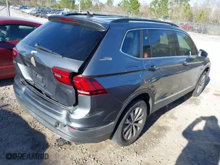 2018 Volkswagen Tiguan SEL with VIN 3VV3B7AX6JM015971, listed as a IAAI auction lot 41712580 with 138,681 mi miles. Bid and sale history available at carsss.com. Image 4.