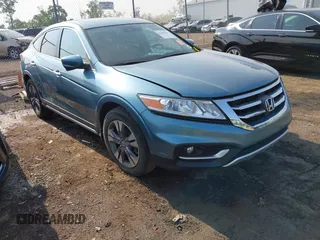 2014 Honda Crosstour EX-L z VIN 5J6TF2H51EL000273, wystawiony jako IAAI lot #42469440 z przebiegiem 98 269 mil mil oraz . Historia ofert i sprzedaży dostępna na DreamBid. Obrazek 1.