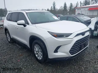 2024 Toyota Grand Highlander Hybrid XLE with VIN 5TDACAB50RS009866, listed as a IAAI auction lot 41976658 with 76,390 mi miles. Bid and sale history available at carsss.com. Image 1.