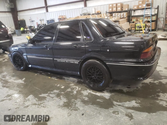 1988 Mitsubishi Galant with VIN E39A0010917, listed as a Copart auction lot 44421775 with 14,813 mi miles and Salvage Title. Bid and sale history available at DreamBid. Image 2.