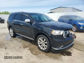 2017 Dodge Durango Citadel with VIN 1C4RDJEG5HC904931, listed as a Copart auction lot 54357555 with 157,158 mi miles and Salvage title. Bid and sale history available at DreamBid. Image 4.