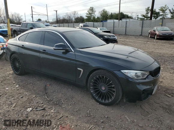 2016 BMW 4 Series 428i xDrive with VIN WBA4C9C59GG136078, listed as a Copart auction lot 49689895 with 143,135 mi miles and Salvage Title. Bid and sale history available at DreamBid. Image 4.