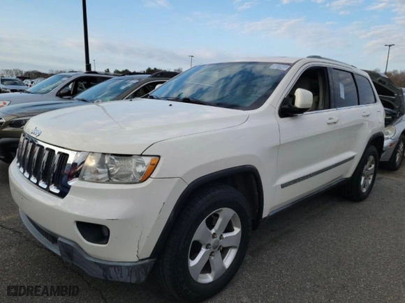 2011 Jeep Grand Cherokee Laredo with VIN 1J4RR4GG1BC669834, listed as a Copart auction lot 52923845 with 173,943 mi miles and Clean Title. Bid and sale history available at carsss.com. Image 2.