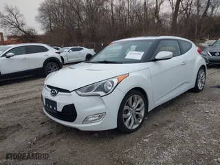 2015 Hyundai Veloster RE:FLEX with VIN KMHTC6AD1FU232077, listed as a IAAI auction lot 41529502 with 201,833 mi miles. Bid and sale history available at carsss.com. Image 2.