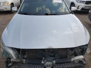 2019 Nissan Altima 2.5 Platinum with VIN 1N4BL4FV9KC100518, listed as a IAAI auction lot 41611860 with 150,216 mi miles. Bid and sale history available at carsss.com. Image 10.