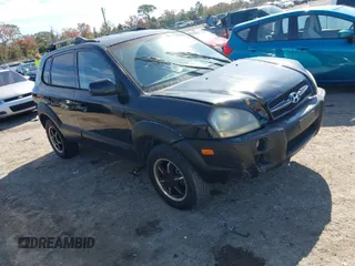 2005 Hyundai Tucson GLS with VIN KM8JN72D55U058390, listed as a IAAI auction lot 41420416 with 197,993 mi miles. Bid and sale history available at carsss.com. Image 1.