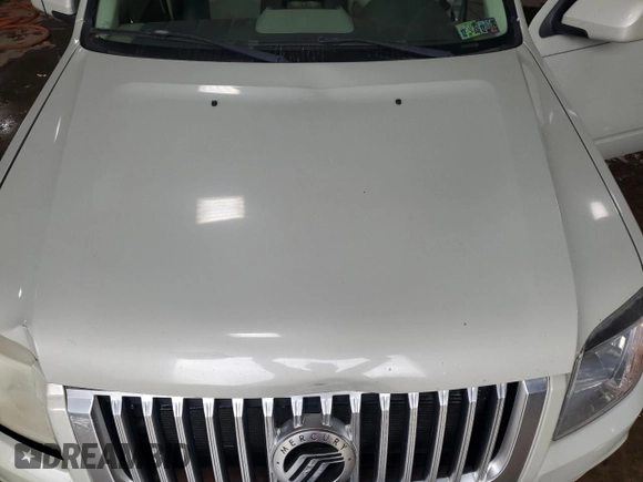 2009 Mercury Mariner Premier with VIN 4M2CU97G59KJ20381, listed as a Copart auction lot 56682175 with 155,896 mi miles and Salvage title. Bid and sale history available at DreamBid. Image 12.
