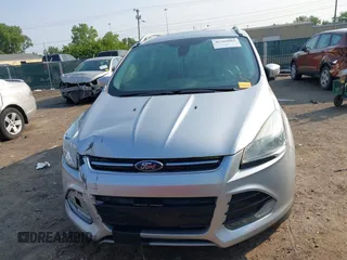 2015 Ford Escape Titanium z VIN 1FMCU0J90FUC02039, wystawiony jako IAAI lot #42369882 z przebiegiem 156 287 mil mil oraz . Historia ofert i sprzedaży dostępna na DreamBid. Obrazek 11.