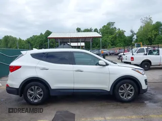 2014 Hyundai Santa Fe z VIN 5XYZTDLB5EG147354, wystawiony jako IAAI lot #42235940 z przebiegiem 107 466 mil mil oraz . Historia ofert i sprzedaży dostępna na DreamBid. Obrazek 13.