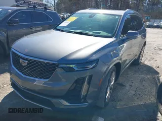 2020 Cadillac XT6 FWD Premium Luxury with VIN 1GYKPCRS3LZ137194, listed as a IAAI auction lot 41569297 with 61,966 mi miles. Bid and sale history available at carsss.com. Image 2.