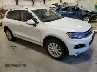 2012 Volkswagen Touareg Exec with VIN WVGEF9BP4CD011823, listed as a Copart auction lot 84063034 with 110,694 mi miles and Non Repairable. Bid and sale history available at DreamBid. Image 4.