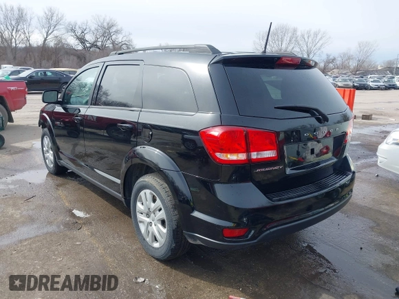 2019 Dodge Journey SE with VIN 3C4PDCBB8KT844800, listed as a IAAI auction lot 41721062 with 148,390 mi miles and . Bid and sale history available at DreamBid. Image 3.