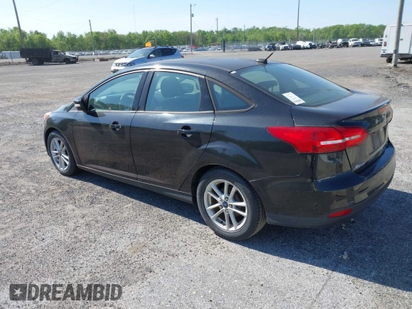 2015 Ford Focus SE with VIN 1FADP3F28FL204176, listed as a IAAI auction lot 42132656 with Not Provided miles. Bid and sale history available at carsss.com. Image 3.