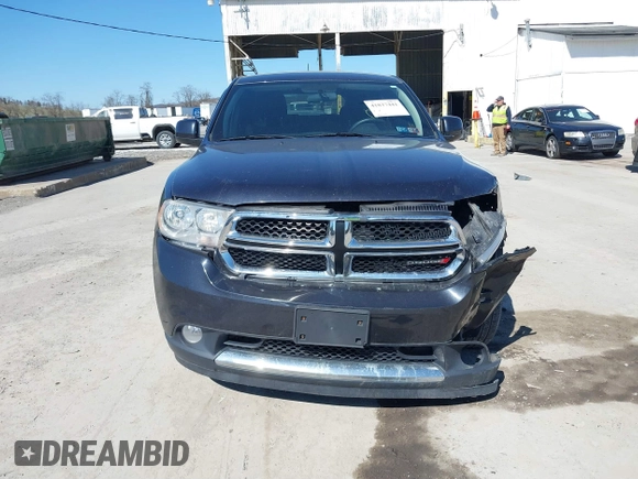 2013 Dodge Durango SXT with VIN 1C4RDJAG2DC530407, listed as a IAAI auction lot 41837441 with 133,375 mi miles and . Bid and sale history available at DreamBid. Image 12.