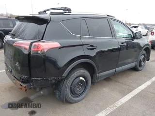 2016 Toyota RAV4 LE with VIN 2T3BFREV3GW447802, listed as a IAAI auction lot 41985438 with 213,247 mi miles. Bid and sale history available at carsss.com. Image 4.