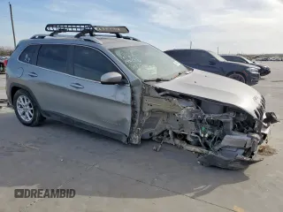 2015 Jeep Cherokee Latitude with VIN 1C4PJLCB4FW539933, listed as a Copart auction lot 49558245 with 142,828 mi miles and Salvage Title. Bid and sale history available at carsss.com. Image 4.