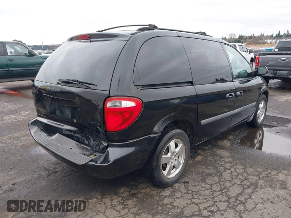 2007 Dodge Caravan SXT with VIN 1D4GP45R87B161237, listed as a IAAI auction lot 41594127 with 154,508 mi miles and . Bid and sale history available at DreamBid. Image 4.
