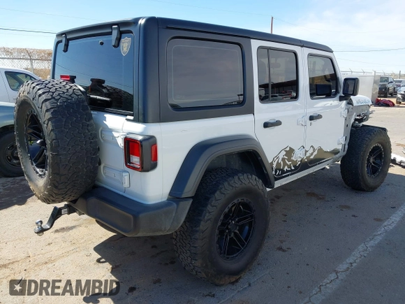 2020 Jeep Wrangler Unlimited Sport with VIN 1C4HJXDG0LW174393, listed as a IAAI auction lot 41575040 with 68,418 mi miles and . Bid and sale history available at DreamBid. Image 4.