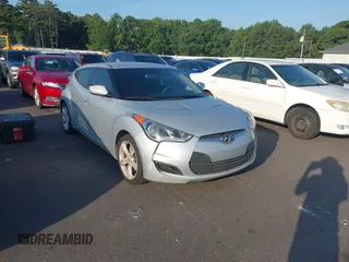 2015 Hyundai Veloster with VIN KMHTC6AD8FU224235, listed as a IAAI auction lot 42795384 with 120,743 mi miles and . Bid and sale history available at DreamBid. Image 1.