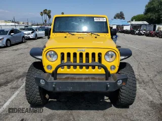 2015 Jeep Wrangler Rubicon Hard Rock with VIN 1C4BJWCG6FL568665, listed as a Copart auction lot 60282155 with 107,773 mi miles and Salvage title. Bid and sale history available at DreamBid. Image 5.